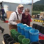 Sigrid Dahlberg and Mark Ridgway stand by firework tubes on Thursday<ins>, July 3</ins>.<ins>,</ins> <ins>2025. (Natalie Buttner / Juneau Empire)</ins>