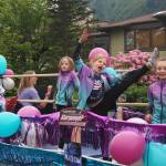 Dancers perform on the TAFY Dance Alaskas float, which won first place for best youth float during the 2025 downtown Juneau Fourth of July parade. (Natalie Buttner / Juneau Empire)