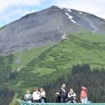 Spectators enjoy the womens race at the Mount Marathon Race on July 4, 2025, in Seward, Alaska. (Photo by Jeff Helminiak/Peninsula Clarion)