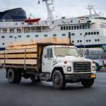 A truck carrying posts and beams from Petersburg arrives in Sitka on the ferry on Monday, June 30. (Photo courtesy of Lee House / Sitka Conservation Society)