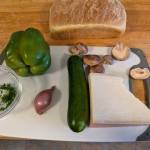 Zucchini, mushrooms, Gruyere, green peppers, shallots, herbs and bread are ready for preparation. (Photo by Patty Schied)