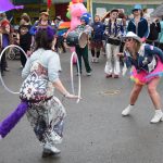 Members of the Parkstrippers Marching Band dance in the Causeway during Salmonfest on Saturday, Aug. 2, 2025, at the Kenai Peninsula Fairgrounds in Ninilchik, Alaska. (Delcenia Cosman/Homer News)