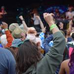 Salmonfest-goers dance on the lawn by the Ocean Stage during Blackwater Railroad Companys performance on Saturday, Aug. 2, 2025, at the Kenai Peninsula Fairgrounds in Ninilchik, Alaska. (Delcenia Cosman/Homer News)