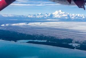 Photo by Martin Truffer
The 18,008-foot Mount St. Elias rises above Malaspina Glacier and Sitkagi Lagoon (water body center left) in 2021.