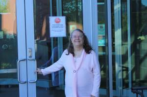 Faith Myers stands at the doors of the Alaska Psychiatric Institute in Anchorage. (File, courtesy photo)