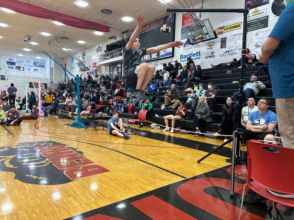 Joseph Rodgers, 12, a member of Chickaloons middle school team, attempts a two-foot high kick during the Traditional Games on Sunday at Juneau-Douglas High School: Yadaa.at Kalé. (Mark Sabbatini / Juneau Empire file photo)