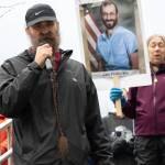 Eric Antrim leads a crowd of more than 200 people at the Dimond Courthouse plaza on Jan. 29, 2026 in a song he wrote after federal agents killed 37-year-old Alex Pretti in Minneapolis. (Chloe Anderson/Juneau Empire)