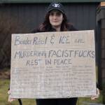 Eleanor Burgess holds a homemade sign with the names of the dozens of people who have died while in ICE custody. A group of 10 Juneauites gathered outside Senator Lisa Murkowskis Juneau office on Feb. 4, 2026 to hold a peaceful discussion with Senate staff. (Chloe Anderson/Juneau Empire)
