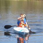 Photo courtesy of Kristin Hempel
Atticus Hempel and his dad, Chris, kayak on Milf Pond in Connecticut in 2007. Atticus, who is four years old in this photo, said his dad has encouraged him to get outside for as long as he can remember. My dads motto is, Take a winding route in life, and this was definitely out of bounds, Hempel said of moving to Alaska during college.