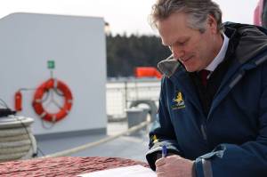 Clarise Larson / Juneau Empire
Gov. Mike Dunleavy signs a memorandum of understanding March 9, 2023 between the Alaska Department of Transportation and Public Facilities and Goldbelt Inc. to pursue engineering and design services to determine whether its feasible to build a new ferry terminal facility in Juneau at Cascade Point.