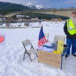 Juneau resident Dune Rothman helped attendees register to vote or check their voter registration at the No Kings rally on March 28, 2026. (Photo by Corinne Smith/Alaska Beacon)