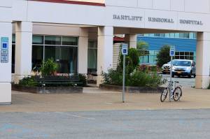 A bike is parked outside the main entrance of Bartlett Regional Hospital on Thursday, July 27, 2023. (Mark Sabbatini/Juneau Empire file photo)
