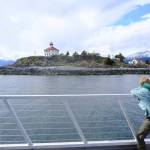 A young passenger on the M/V Seawolf views the Eldred Rock Lighthouse on May 30, 2026. (Photo by Corinne Smith/Alaska Beacon)