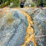 Acid contaminated water runs from the entrance of the Tulsequah Chief Mine in Canada. (Courtesy photo)